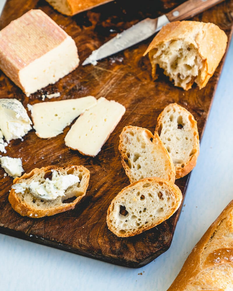 Baguette on cheese board